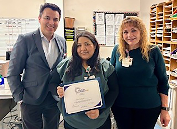 Covid Test Eva Cerezo Named Exemplary Employee
